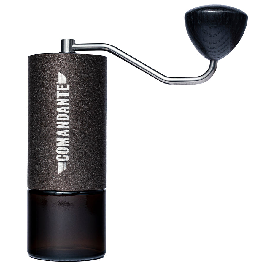 Comandante C40 Nitro Blade hand coffee grinder in copper mountain finish with ergonomic handle and durable build.