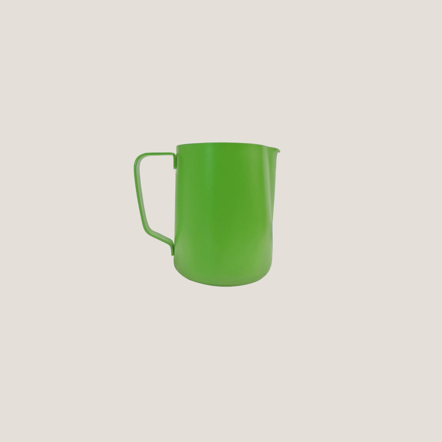 Light green Teflon barista's milk pitcher from Cloud Picker Coffee for steamed milk and latte art.