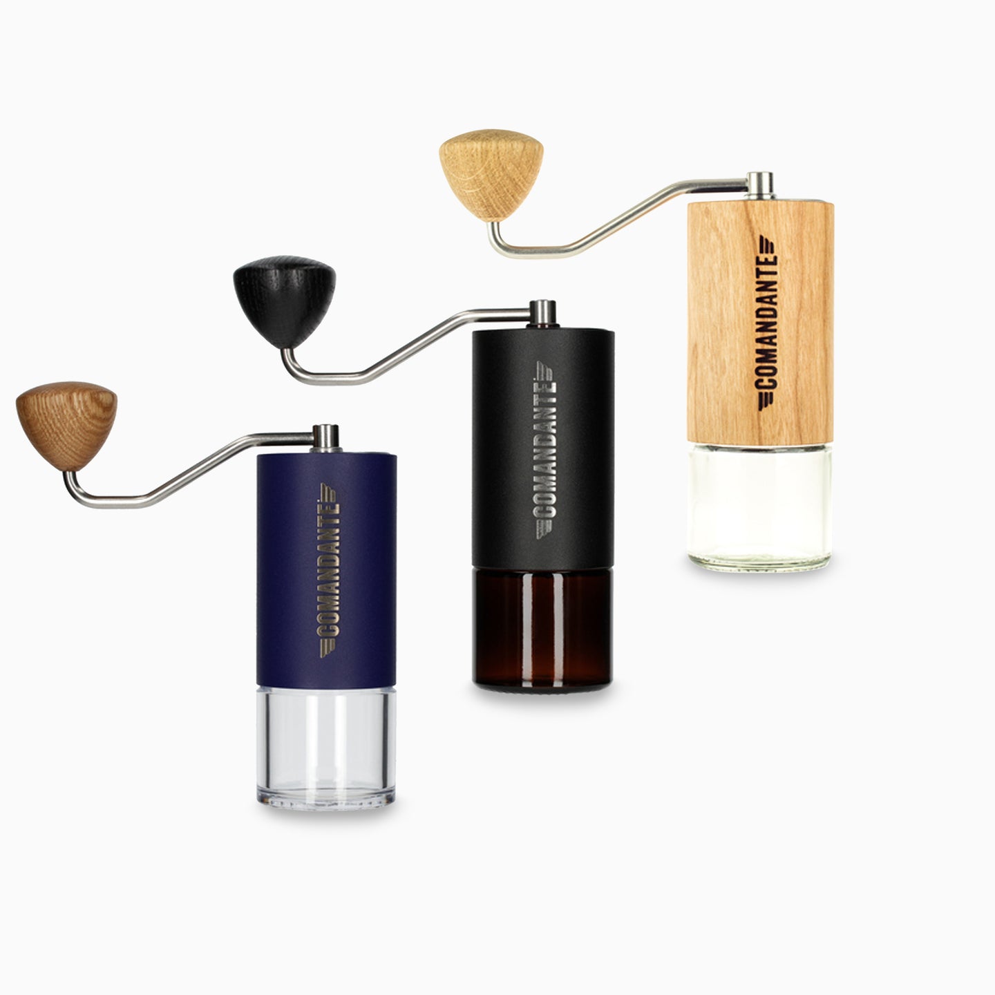 Comandante C40 Nitro Blade hand coffee grinder with wooden handle and stainless steel burrs, used for precise coffee grinding.
