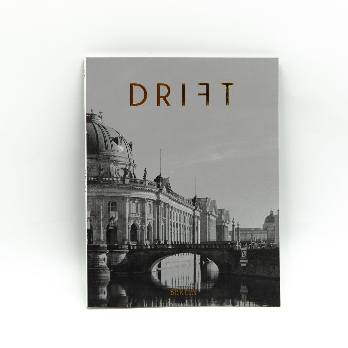 Close-up of a Drift Magazine accessory from Cloud Picker Coffee, featuring textured surface and branded details.