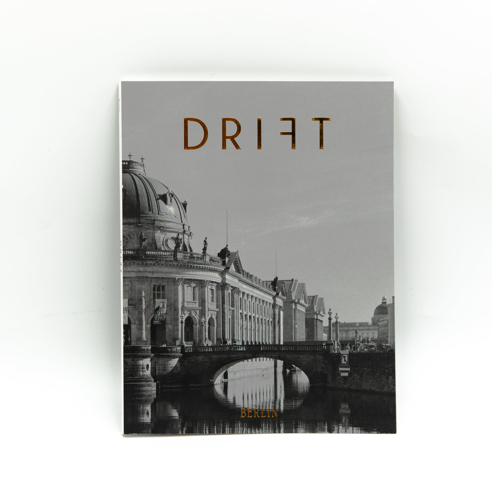 Close-up of a Drift Magazine accessory from Cloud Picker Coffee, featuring textured surface and branded details.