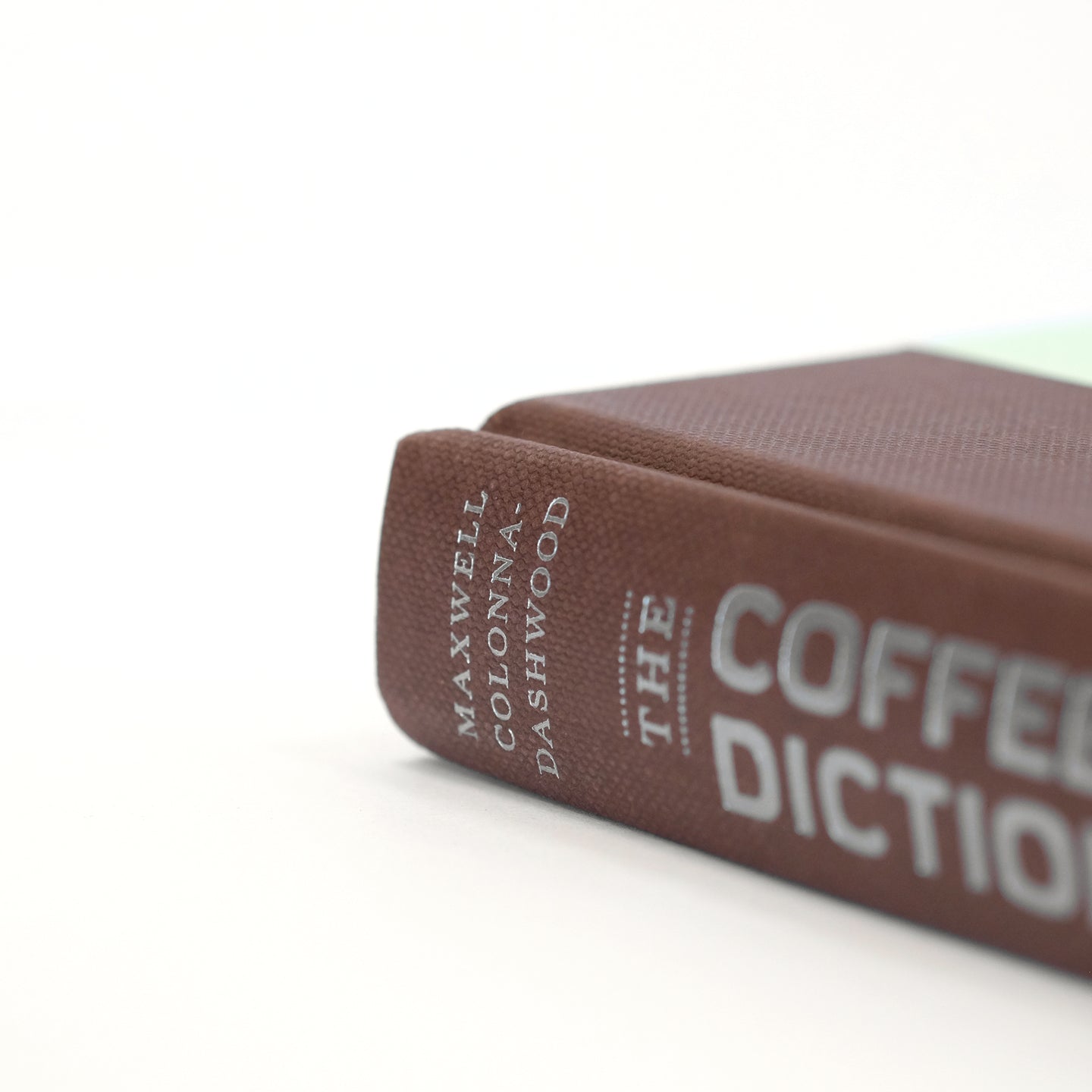 Close-up of a page from Cloud Picker Coffee's The Coffee Dictionary accessory, showcasing detailed coffee terminology and illustrations.