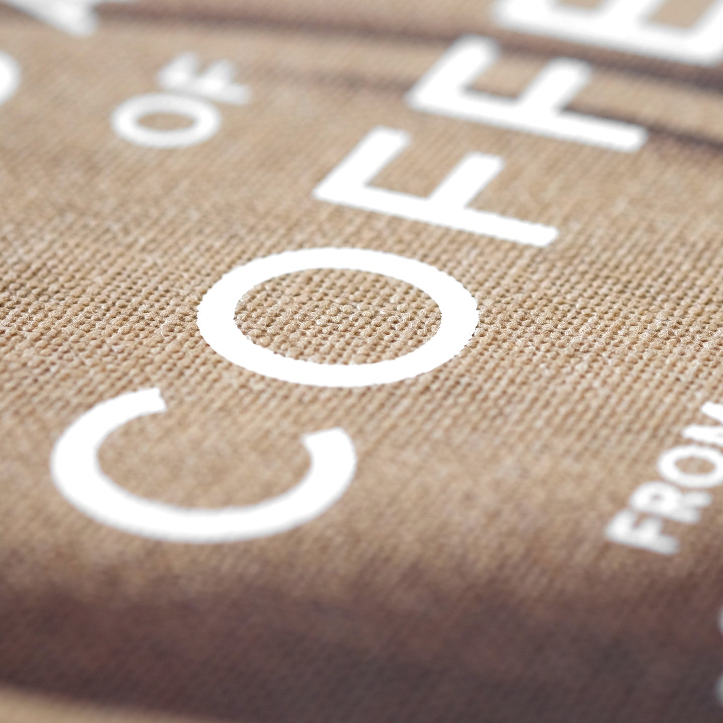 World Atlas of Coffee merchandise by Cloud Picker Coffee featuring a detailed coffee-themed map and branding.