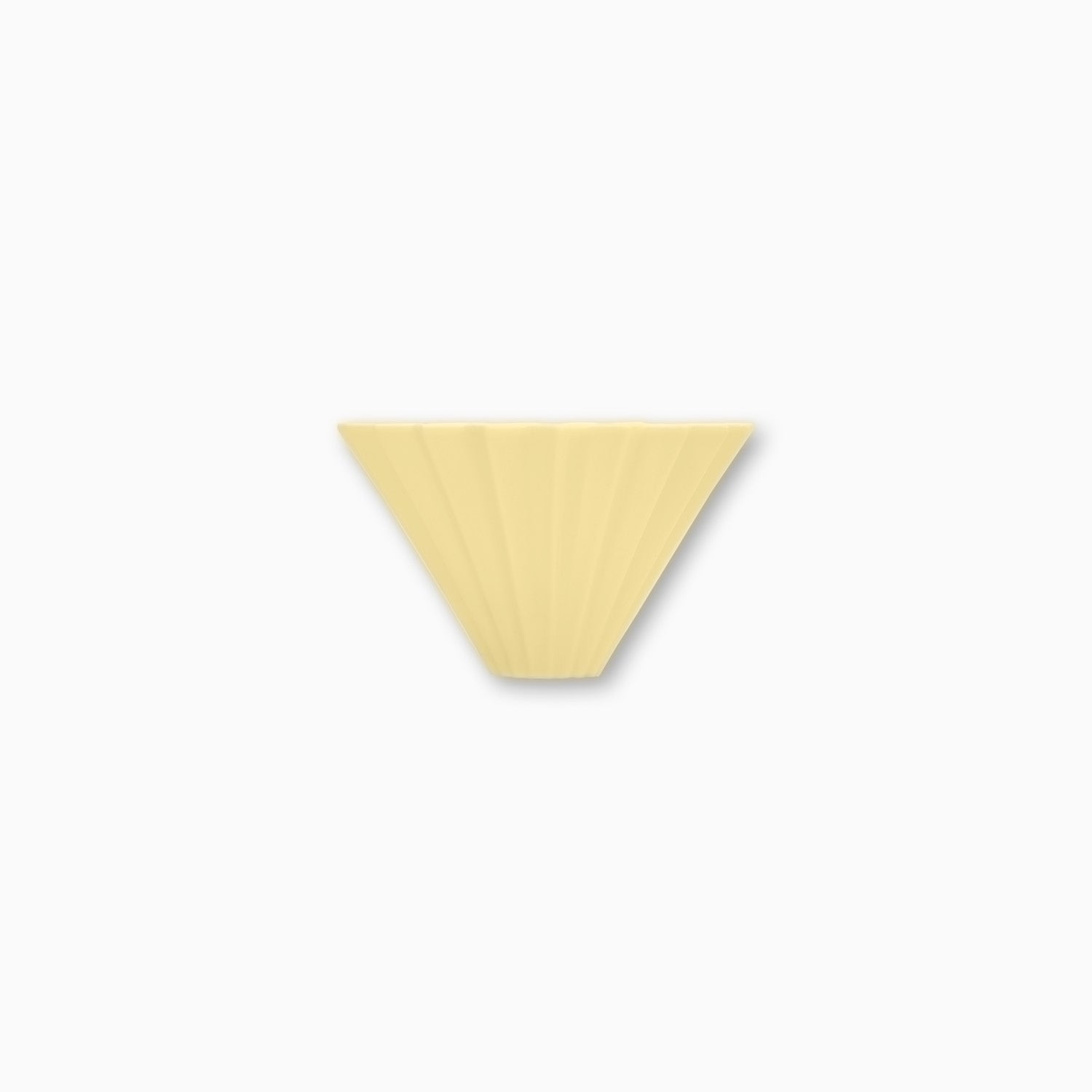 Yellow ceramic origami-shaped coffee dripper with wooden holder, designed by Cloud Picker Coffee for brewing coffee.